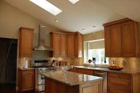 Kitchens Kraftmaid Cabinets Ginger Sandstone Glass Tiles Suzie Kraftmaid Cabinets Ginger Glaze Custom Kitchen Cabinets Kitchen Design Kitchen Designs Layout