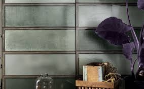 This 1'' x 4'' green and turquoise glass tile replicates the classic brick wall layout, forming an appealing contrast between the classic glass mat. Industrial Glass Green Floor And Wall Tiles Iris Ceramica