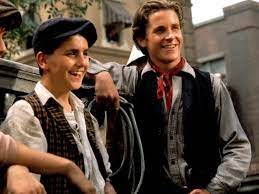 Newsies (released as the news boys in the united kingdom) is a 1992 american musical historical drama film produced by walt disney pictures and directed by choreographer kenny ortega in his film directing debut. Then And Now Photos Of The Newsies Cast 29 Years Later