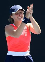 Iga swiatek poses with the trophy in the locker room after winning the french open. Pin On People