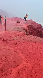 Chilling videos show eerie 'blood rain' as beach is turned bright RED in  Biblical scenes: 'The power of God'
