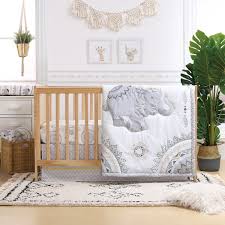 A modern and luxurious baby crib bedding set is one of the most cherished and important gifts which embellishes and brightens up your baby's nursery. Boho 3 Piece Crib Baby Bedding Set With Elephants