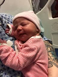 Baby born via c-section after complications