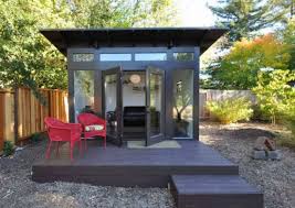 Two horizontal ipe wood structures provide contemporary accents. Small Backyard Ideas 9 Ideas To Make Yours Feel Grand Bob Vila