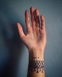 Filipino Tribal Snake Scales And Tongue Design Hand Tapped By The Legendary Kalinga Tattooer Whan Filipino Tattoos Tribal Arm Tattoos Hand And Finger Tattoos