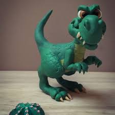 Small worms/ snakes of clay create great rolls, wrinkles, and folds in the skin. T Rex Dinosaur Sculpture In Polymer Clay Clay Dinosaur Polymer Clay Clay Mugs