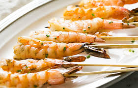 Thread the shrimp, bell peppers and onions onto skewers. Grilled Garlic Shrimp Skewers Recipe