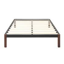 Crafted from steel with a white finish, this platform bed includes a slat kit, so there's no need to add a box spring: Platform Full Bed Frame Wayfair