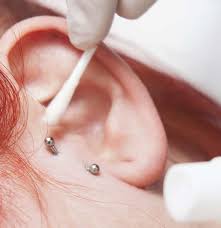 I sprained mine during a spartan race and still ran 7 more miles and that took about a week to be fine, but a month to fully heal. Infected Tragus Piercing Symptoms Treatment And Home Remedies