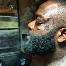It would technically be playthrough number 3 but my first time i didn't play it all the way through. Rick Ross Just Got Seven Tattoos On His Face Fact Magazine