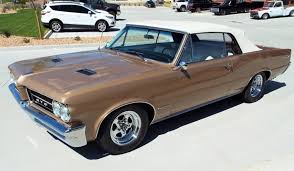 Image result for Singapore Gold 1964 GTO