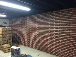 If its a basement wall, you will need a heater and a dehumidifier. Painted Brick Form Poured Concrete Basement Walls With Ceiling Painted Black Concrete Basement Walls Brick Waterproofing Basement Walls