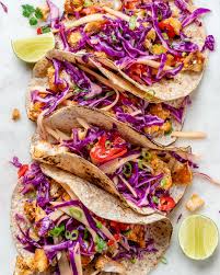 White fish, mango salsa, tortillas, and optionally a crema. Fish Tacos With Limey Mango Cabbage Slaw For Epic Clean Eats Clean Food Crush