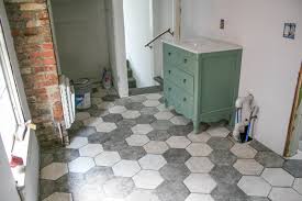 With so many flooring options available online and in stores, you can practically get any tile you need for your these farmhouse bathroom floor tiles are all great options to add some farmhouse style to your home. Bathroom Makeover With Hexagon Tile Floor And Blue Vanity Diy Show Off Diy Decorating And Home Improvement Blogdiy Show Off Diy Decorating And Home Improvement Blog