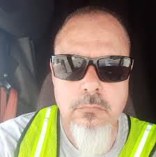 Marine Corps veteran Todd Winn, a Purple Heart recipient, protested in  front of the Utah State Capitol for hours over the weekend with his mouth  taped shut and the words “I can't