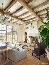 Desert Farmhouse With Warm Traditional And Rustic Interiors Cozy Living Room Design House Design Eclectic Farmhouse