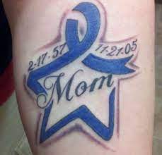 The dark blue ribbon is an indication of colon cancer and a tribute to the survival or battle with that disease. 36 Tattoo Ideas Cancer Tattoos Ribbon Tattoos Cancer Ribbon Tattoos
