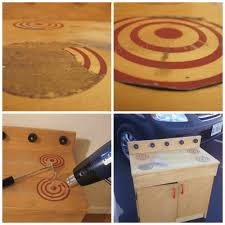 A drill and drill bits; Before And After Makeover Of A Wooden Play Kitchen