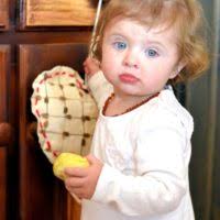 A child counts his eggs after participating in an egg