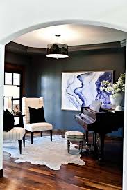 Below, we have gathered over 25 living rooms that use darker furniture. How To Bridge The Gap Between Feminine And Masculine Decor