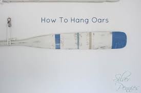 This diy is a perfect outdoor decor. How To Hang Oars Finding Silver Pennies