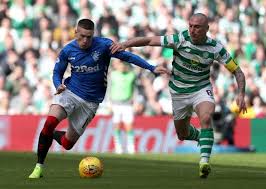 The rivalry between football clubs rangers and celtic goes past typical name calling and dives into violence, racial slurs and pure. Celtic Captain Scott Brown On Putting Old Firm Rivalry Aside To Sign Painting Of Punch From Rangers Ryan Kent Heraldscotland