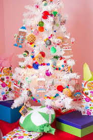 Decked out in festive peppermint, ice cream cones and colorful fruit candies, even jolly old st. Diy Candyland Christmas Decorations Ornaments The Budget Decorator