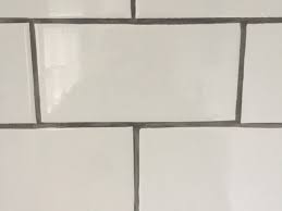 How long does it take tubbed adhesive to dry? Contractor Did Grout Lines Uneven Help