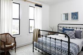 Two master suite house plans are all the rage and make perfect sense for baby boomers and certain other living situations. Iron Bed With Blue And Gray Bedding Transitional Bedroom