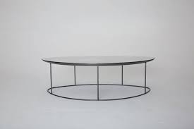 They are omnipresent in all interior designs and aesthetics and come in an. Ochre Moon Pebble Coffee Table Mercury Glass And Steel Excellent Condition For Sale At 1stdibs