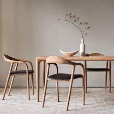 With A German Design Award Nomination And Interior Innovation Award The Popular Latus Table Has A Flowing Modern Dining Table Dining Table Chairs Modern Dining