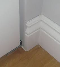 Attach the chair rail to the wall. Baseboard Outside Corner Chair Rail Basement Remodeling Floor Molding