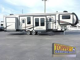 We are a dutchmen rv wholesale 5th wheel toy hauler dealer. Fifth Wheel Rvs With Outdoor Kitchens Convenience Meets Comfort Topper S Camping Center