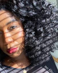 🌤Cloud 9 🌤 Steps for this fluffy stretched twist out: ✨Co-Wash:  @MelaninHaircare Multi-Use Softening Leave In Conditioner ✨Seal + Twist:  @MelaninHaircare Multi-Use Pure Oil Blend ✨Stretch: @MyRevair Reverse Blow  Dryer ✨🌤Simple Dimple🌤✨