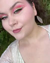 Meet Suba — radiant, confident, and full of light. ✨ She's wearing a pair  of my glitter teardrops, each one holding real dried white flowers. Every  time I get to share photos