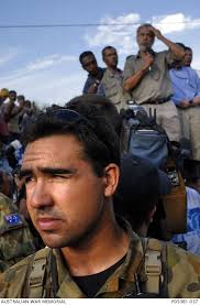 Trooper David (Dave) Farrell, 2 Squadron, Special Air Service Regiment  (SASR) provides security ...