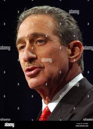Atlanta Falcons owner Arthur Blank speaks at press conference to honor  Warrick Dunn who is named the 2004 NFL Walter Peyton Man of the Year during  the week of Superbowl XXXIX on