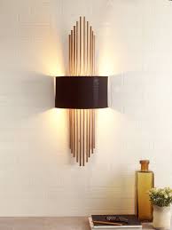 Shop allmodern for modern and contemporary gold wall sconces to match your style and budget. Mervin Black Gold Wall Light Buy Modern Wall Lights Online India Jainsons Emporio