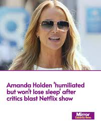 Amanda Holden's new reality show has been panned by the critics, but a  source claims that the veteran presenter is refusing to “focus