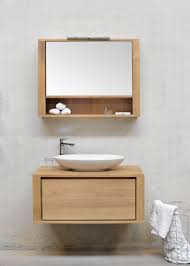 Mirrored doors, shelves and exposed shelf. Shadow Wall Mounted Storage Unit Architonic