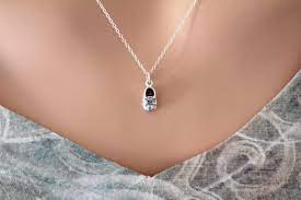 Unlike some relationships, it will never lose its charm thanks to its thick, youthful chain and sleek modern finish. Sterling Silver Small Baby Shoe Charm Necklace Shoe Necklace Etsy