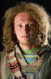 His name is Bill. He has wild hair, wears a T-shirt with holes in it,  jeans, and no shoes. This was literally his wardrobe for his entire four  years of college. He