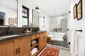 Modern farmhouse bathroom with rustic stool and wicker baskets. 22 Best Farmhouse Bathroom Ideas How To Decorate Bathroom In Farmhouse Style