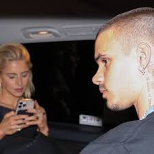 Romeo Beckham, 22, sparks romance rumours with German model Caroline Daur,  30, in Paris as they leave hotel after party