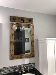 The black vanity table offers a romantic atmosphere with its gray flower patterns. Pin By Maria Guadalupe On Centros Navidad In 2021 Mason Jar Light Fixture Wood Framed Mirror Mirror Wall