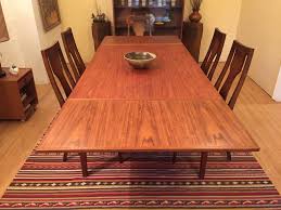 Buying, selling teak and mid century modern furniture and accessories. Vintage Danish Teak Dining Table With Hidden Leaves Epoch