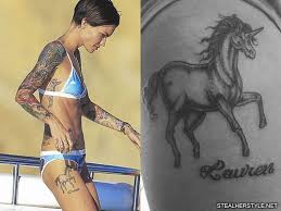 Just a guy with a beard drawing on people. Ruby Rose S 48 Tattoos Meanings Steal Her Style Page 3