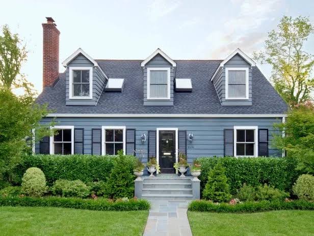 Restored stucco house after exterior painting cost in Surrey application