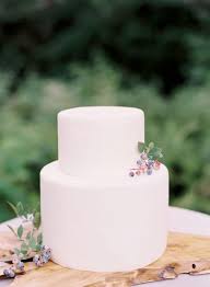 Simple white wedding cake with flowers. 25 Timeless Yet Trendy All White Wedding Cakes Weddingomania