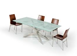 Dining table (1) side chair (4) no, your eyes are not deceiving you. Xavier Modern Cracked Glass Rectangular Dining Table